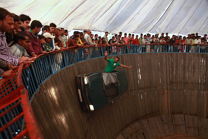 Indian stuntman rides the Wall Of Death