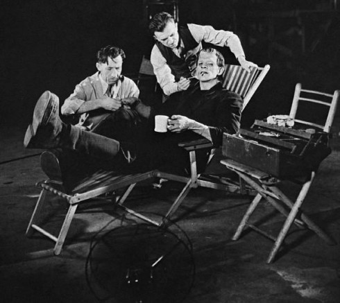 Karloff, as The Monster, between scenes. 